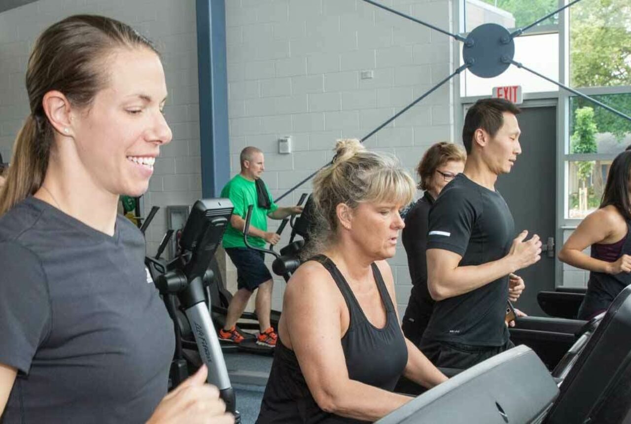 Members Running on Tread Mill